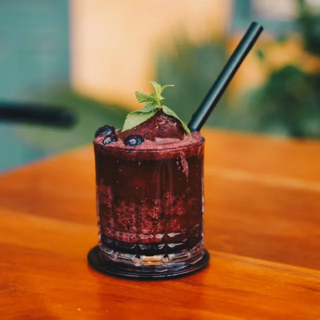 A dark berry cocktail from the garden bar